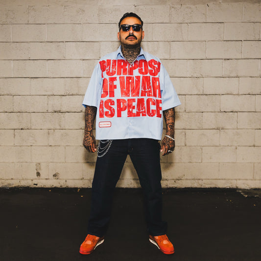 PURPOSE OF WAR IS PEACE BUTTON UP